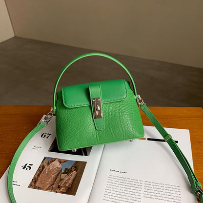 本革バッグ女性ヒツジ革レトロバケツバッグ高級感ミニショルダーバッグシンプルキャンディーカラーのハンドバッグ