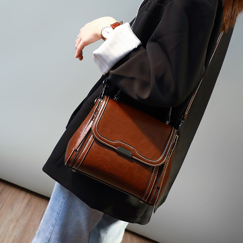 本革女性バッグファッションハンドバッグ何とでも合う斜め掛けバッグブロードバンド牛革ハンドバッグ.カバン